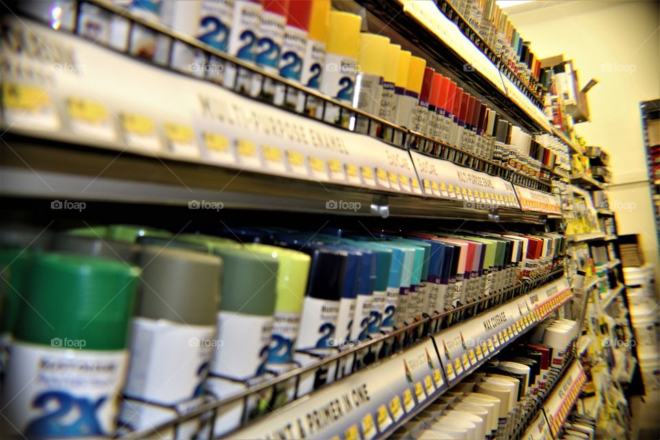 Spray Paint Lined Up on Retail Shelves