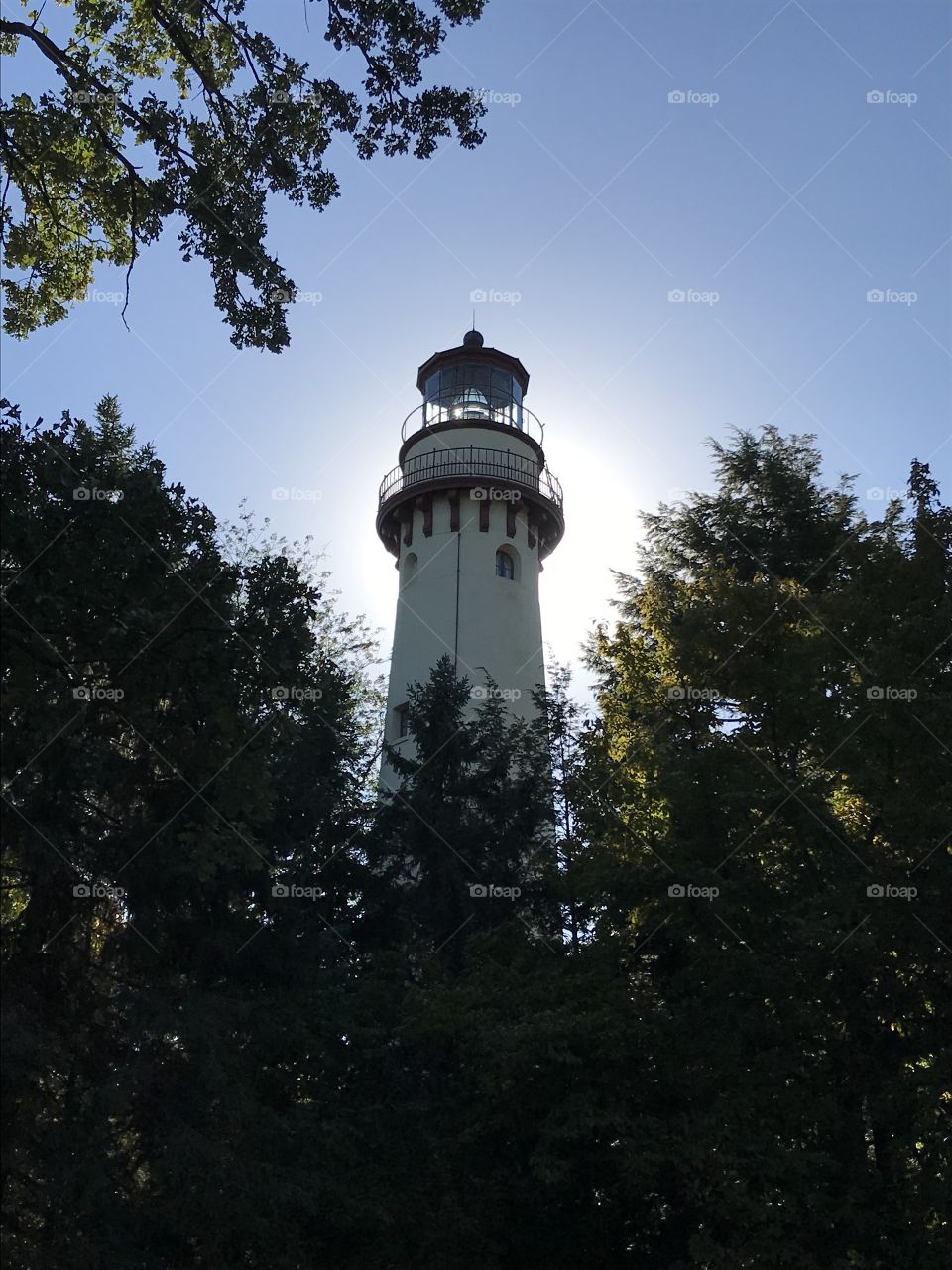 Lighthouse with sun burst