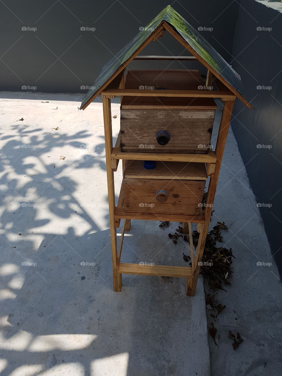 small wooden house bee hive