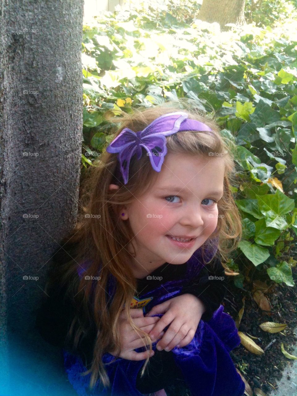 Girl and purple butterfly