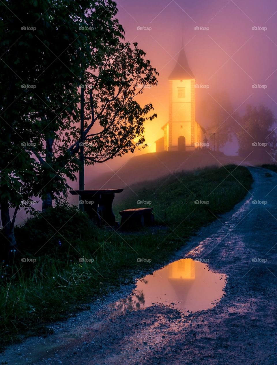 Fog surrounded the hilltop church 
