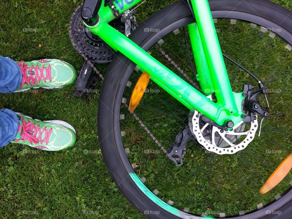 Photo taken with my jogging shoes and my sons bike. Both have a lovely green color.