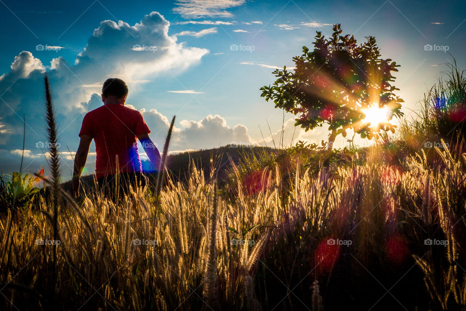 man on a silhouette field