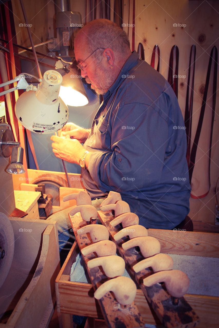 Handmade pipes for smoking. My father in his shop, working his machines.