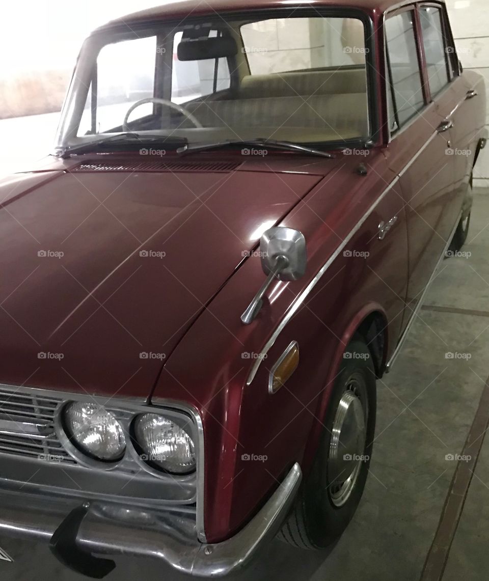 Old brown car beauty on parking vintage 