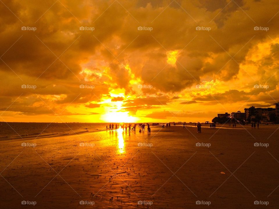 Orange sunset at low tide