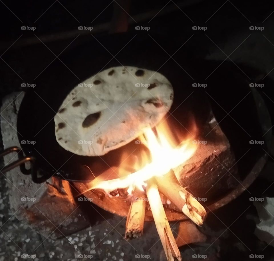 indian make cook chapati roti