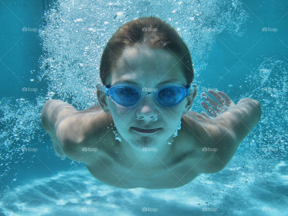 Woman swimming underwater