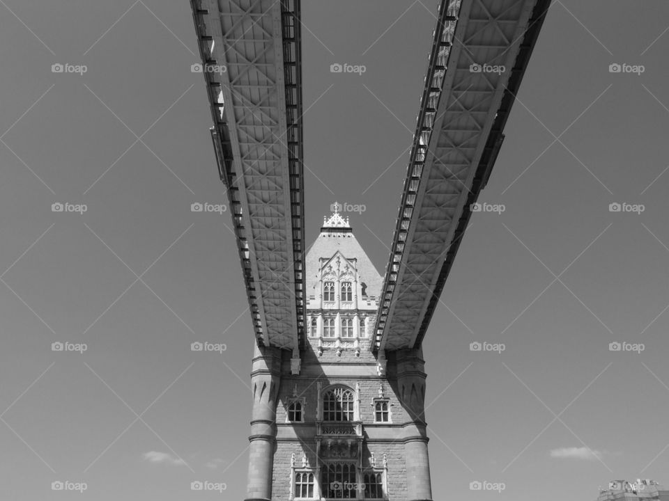 Fine architectural details of Tower Bridge in London, England on a sunny summer day. 