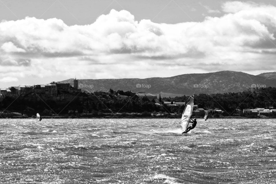 black and white windsurfer