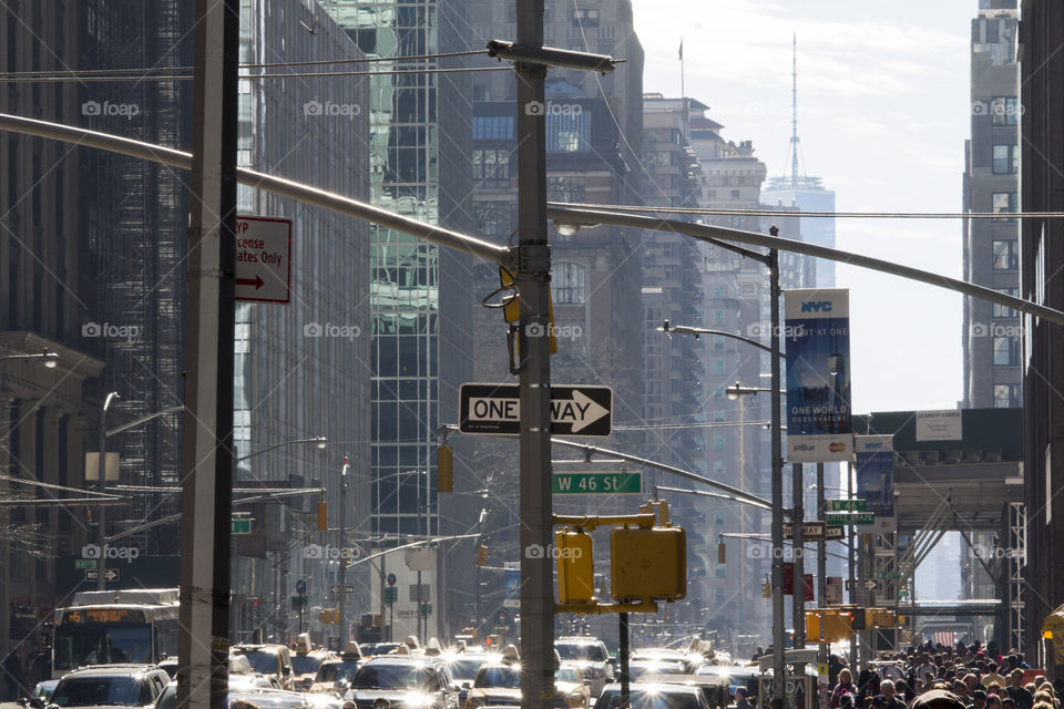 Busy street  / avenue in sunny New York City  - rush hour