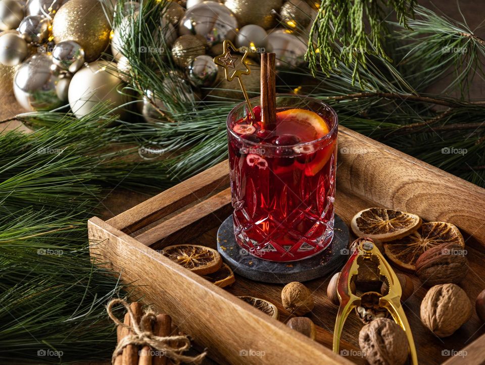 Red mulled wine with cinnamon stick