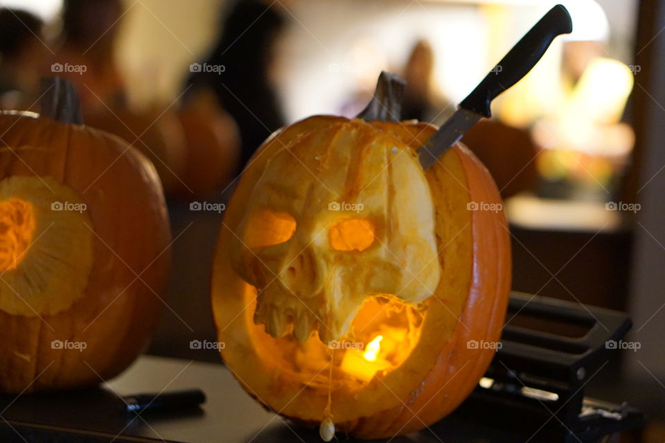 Carved skull pumpkin