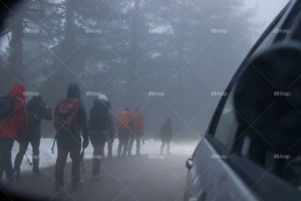 Hikers in the fog