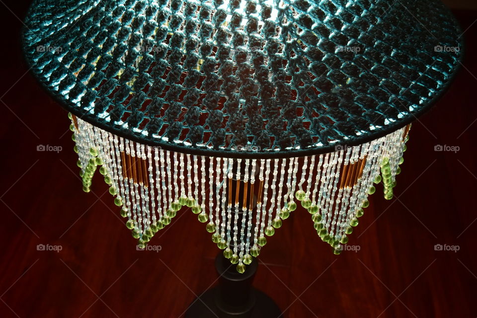 Glass beads hanging from a lampshade
