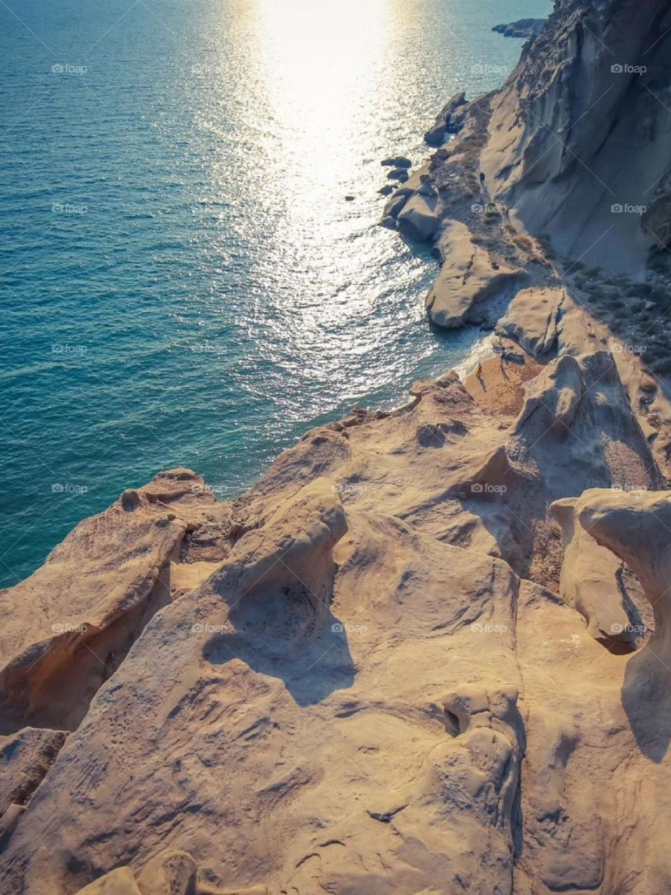 The trip to this rocky beach is unforgettable, I enjoyed walking on the soft sand, watching the blue sky and the sound of the sea waves, lying on the hard rocks and watching the starry night sky.