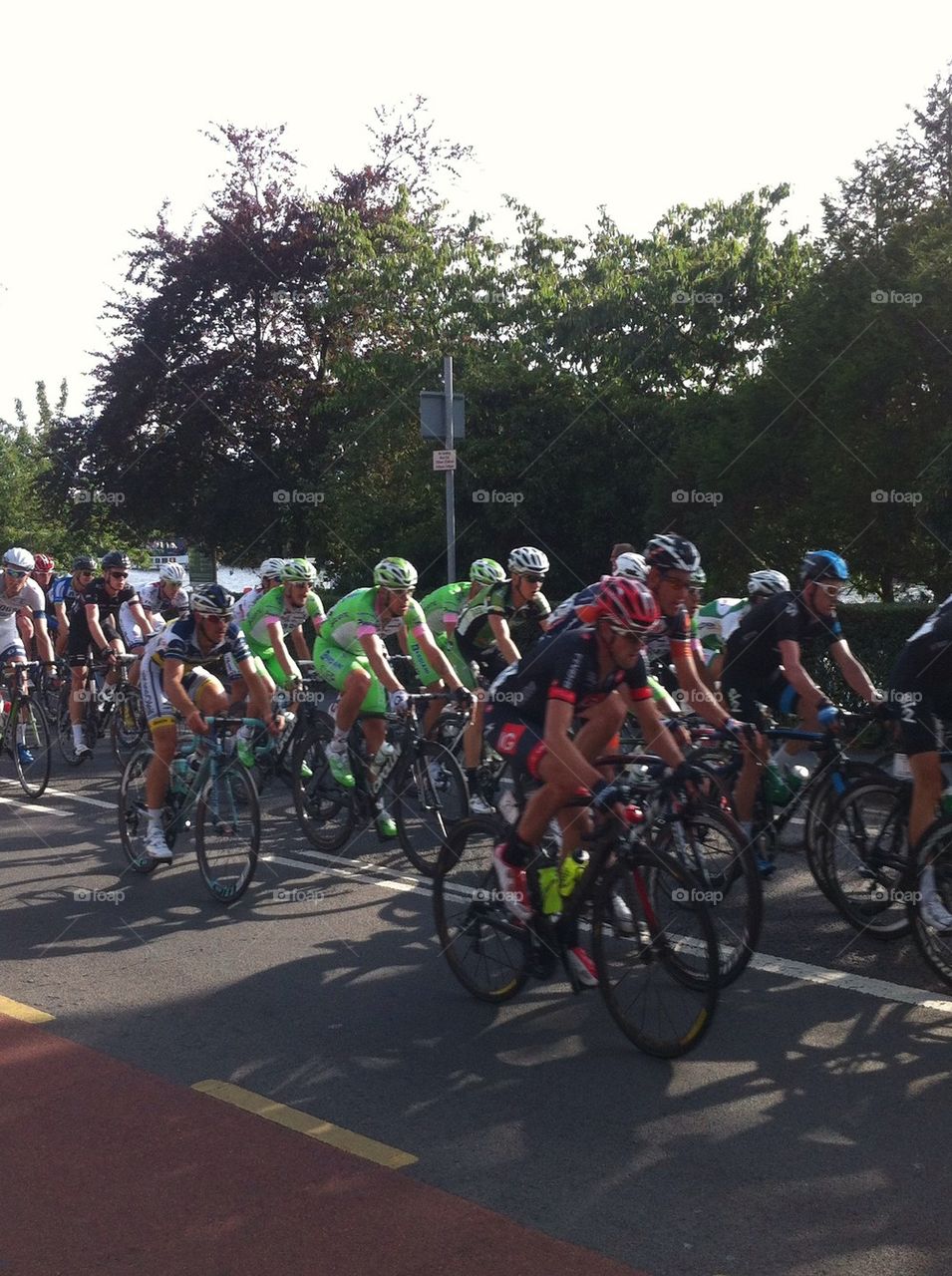 Professional cyclists racing through London