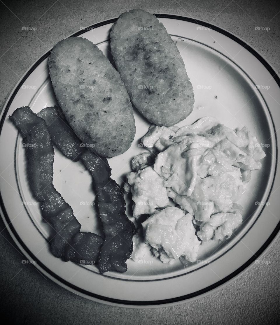 Breakfast. There is nothing like having eggs, bacons and hash browns as an adequate meal in the morning. Altogether they would give one enough energy to survive the the entire day ahead.