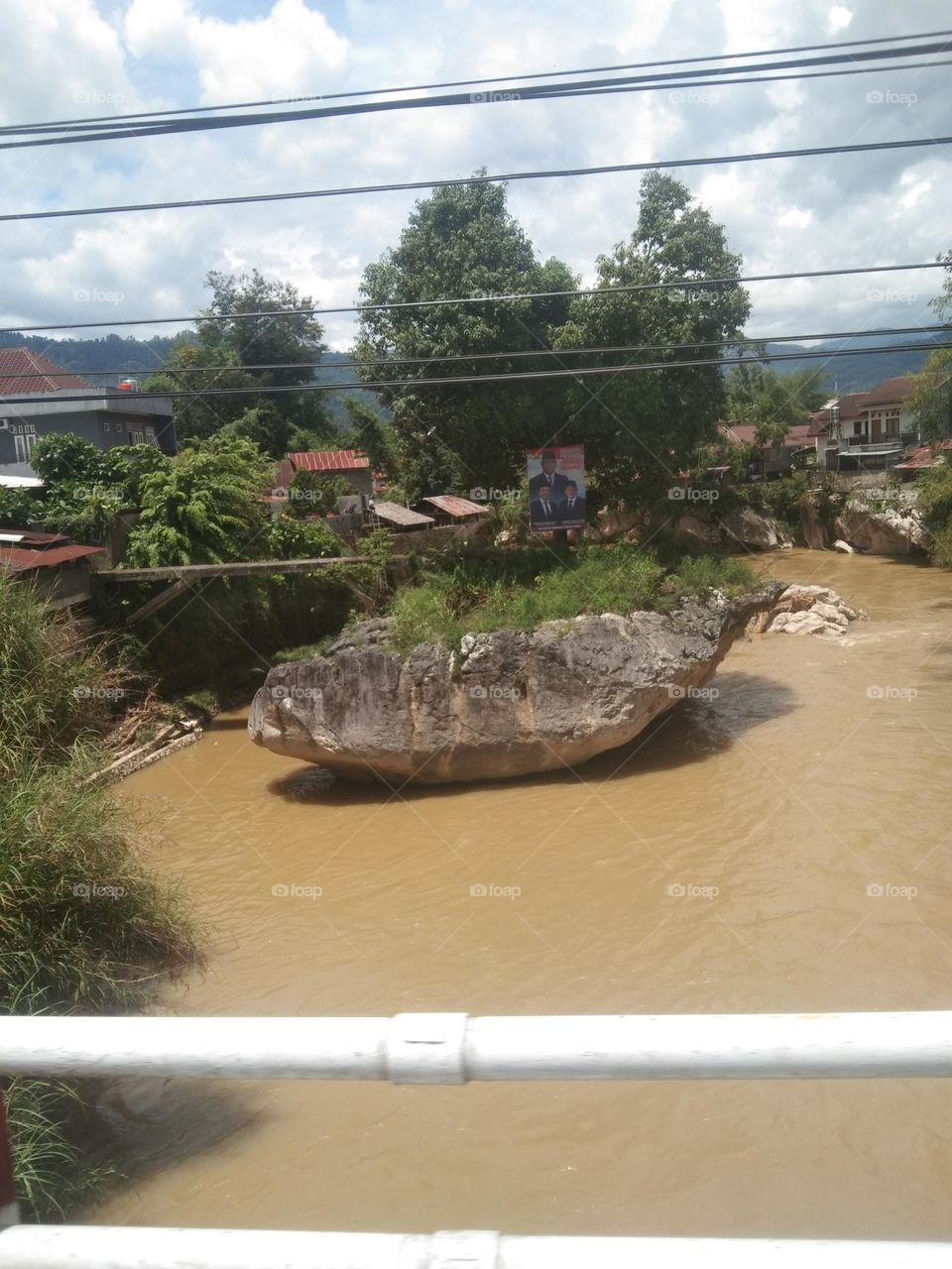 Captured from over  the river bridge, Malangngo-Rantepao, North Toraja, South Sulawesi