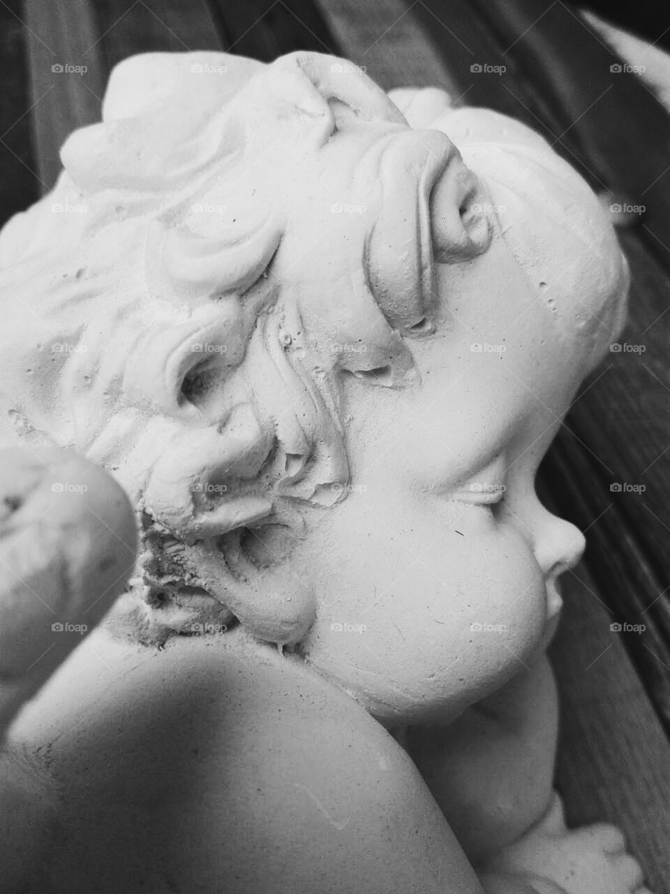 sculpture of a little angel child