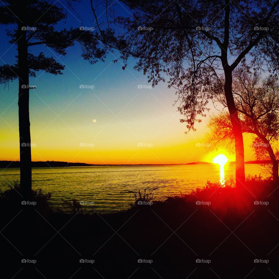 View of idyllic lake at sunset