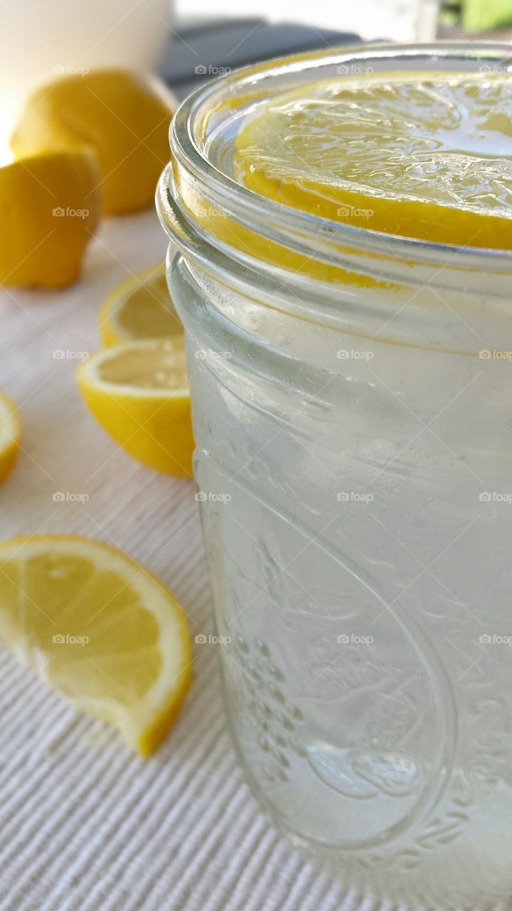 Lemonade with lemons / lemon water with lemons