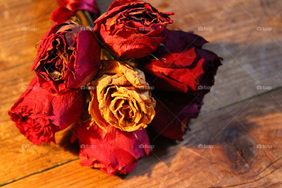 roses on wooden table