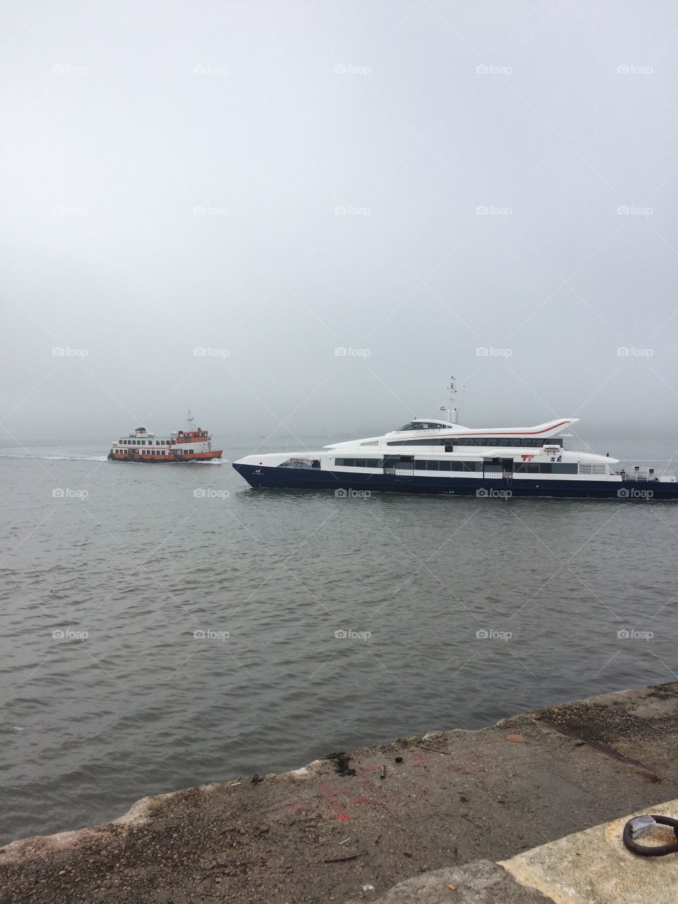 Boats are in the river at Lisbon Portugal 