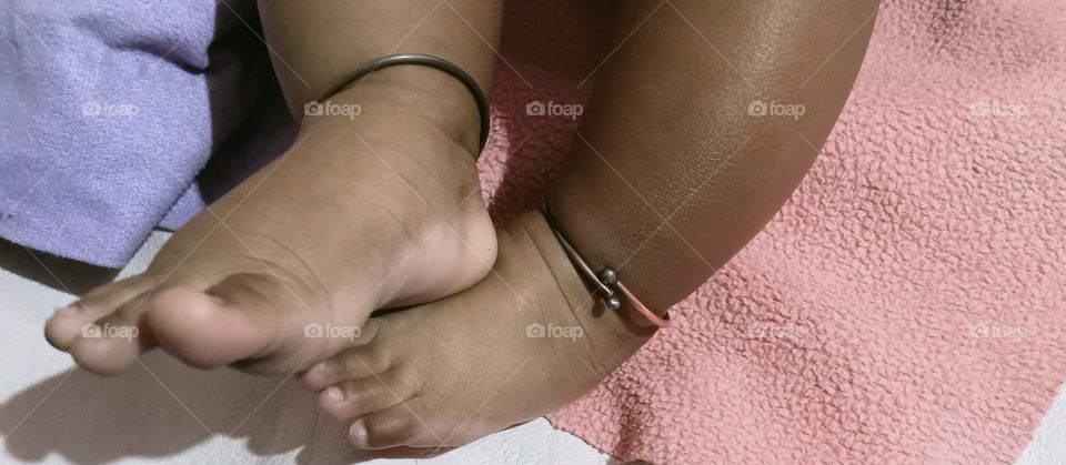 This beautiful β€οΈπ legs 𦡠of two months baby girl π₯π. Baby is sleeping in her bed and playing joyfully with her toys!!πͺπ§Έ