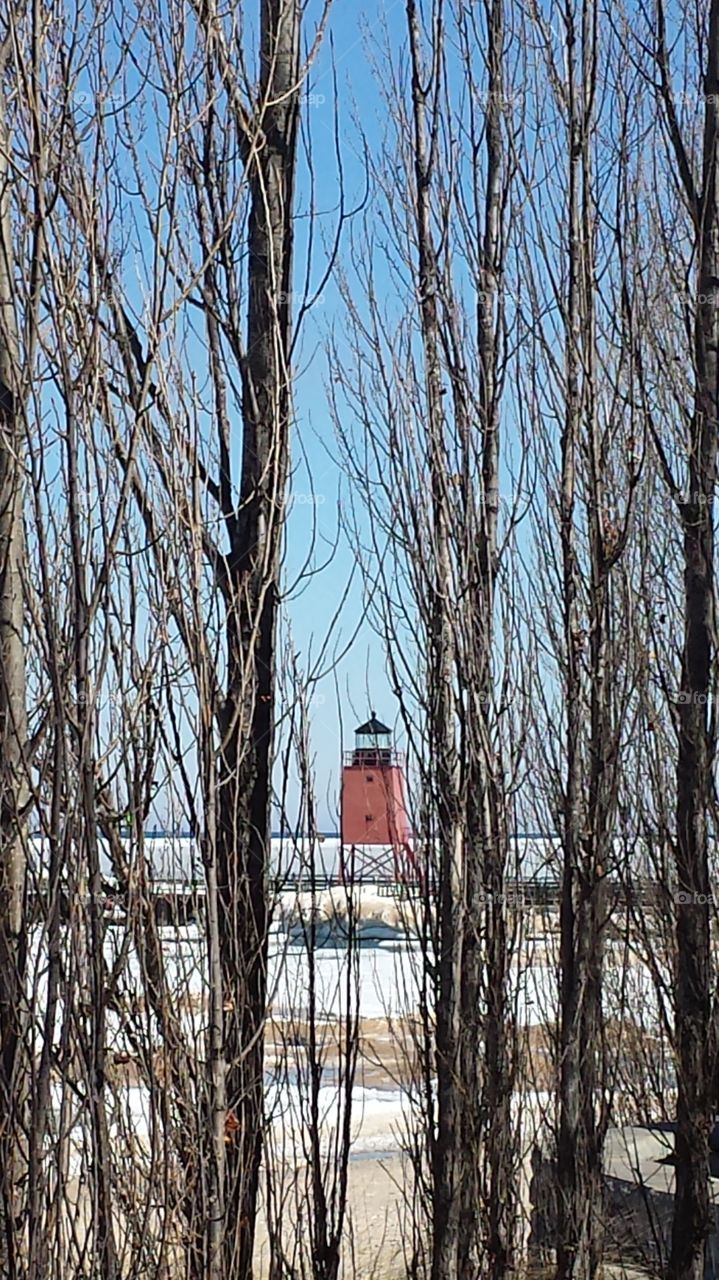 Lighthouse. Lake Michigan in Charleviox