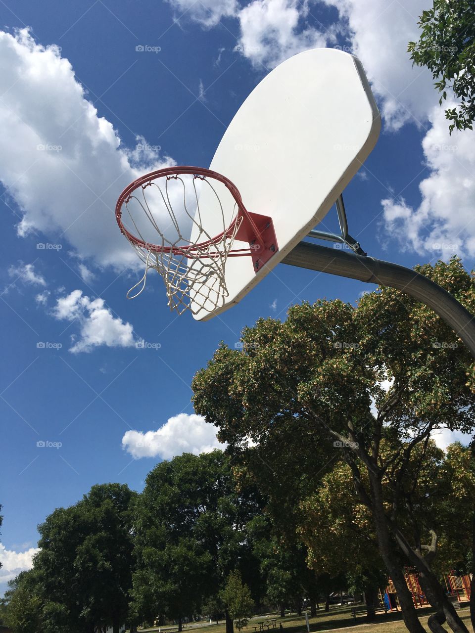 Basketball Net and Blue Sky with Clouds 1