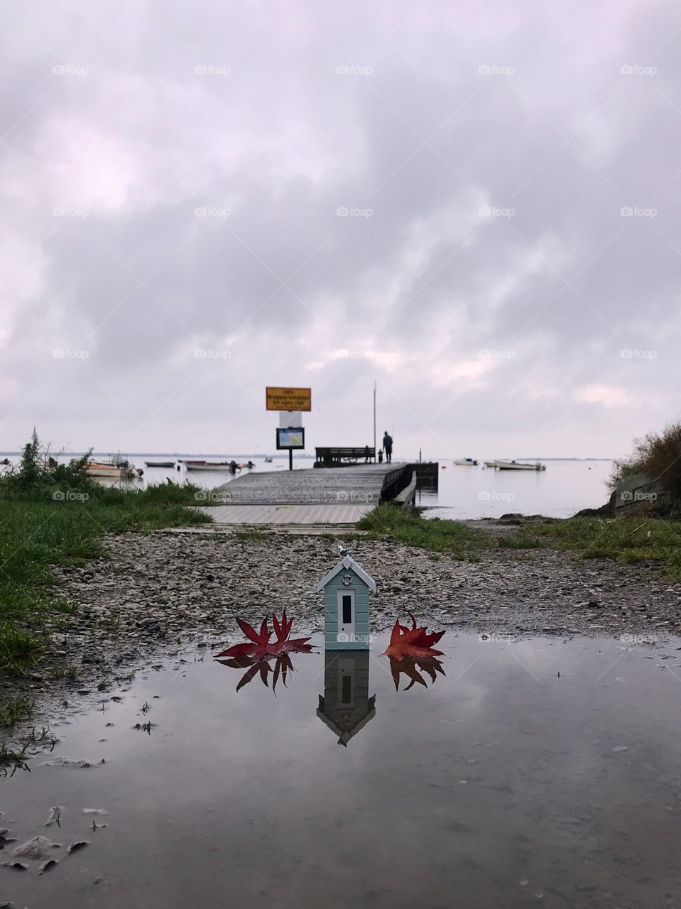 Autumn beachhut by the jetty