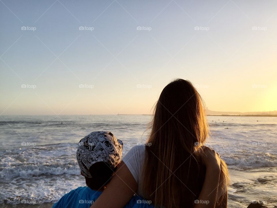 Happy family looking out beach