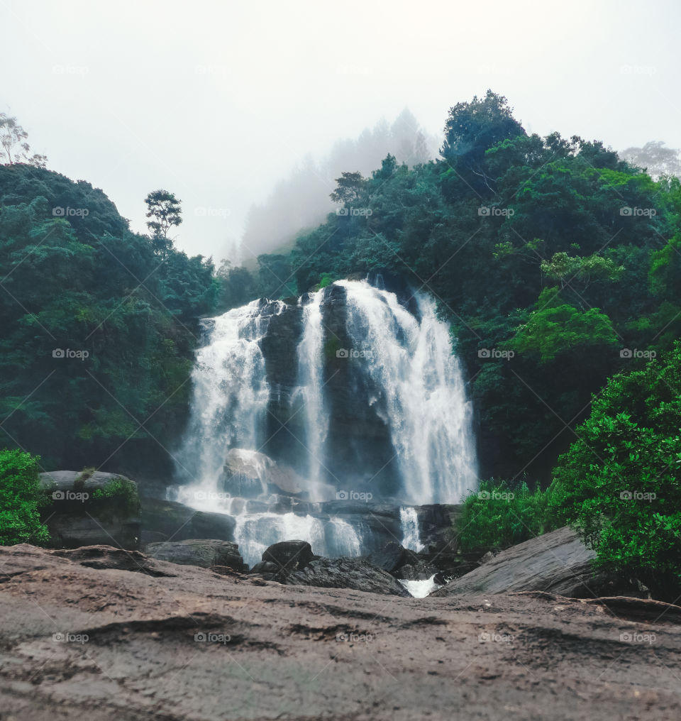 covering the mist with waterfall