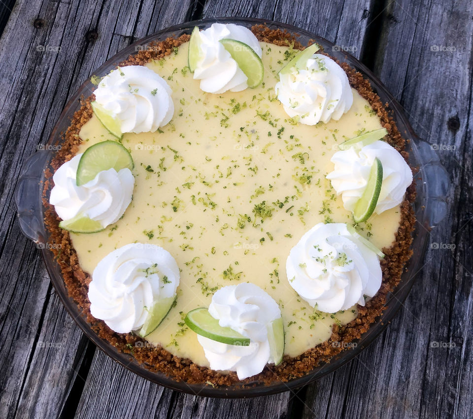 There is nothing more refreshing in the hot summer evenings than a smooth, tangy slice of key lime custard baked into a crunchy graham cracker crust. Don’t forget fresh vanilla whipped cream!
