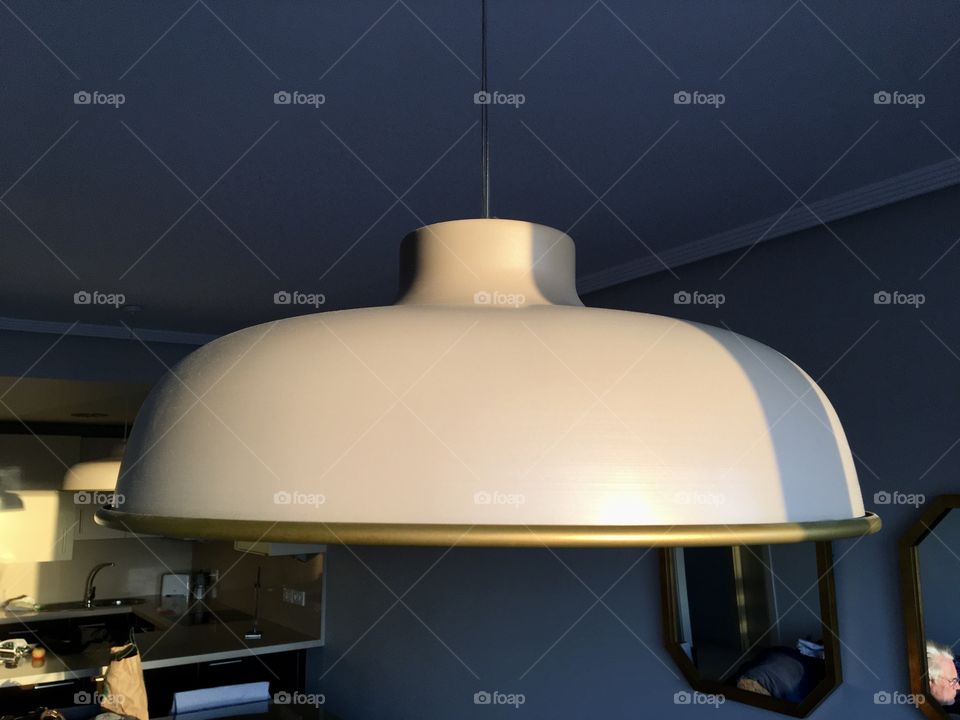 Sun light on electric ceiling lamp