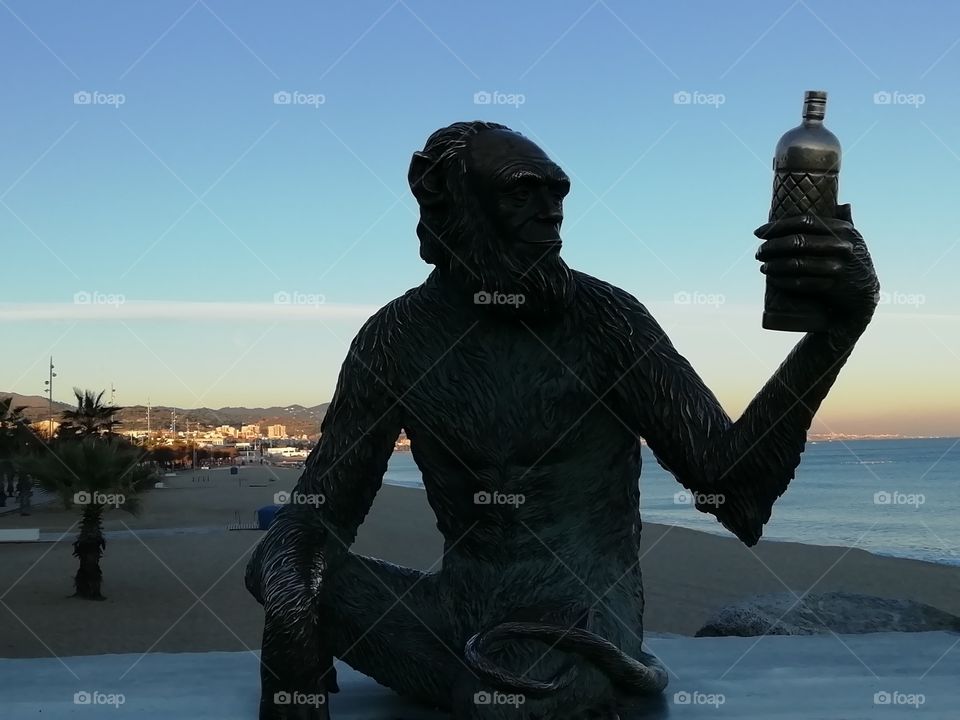 Iconic statue of a drunk monkey