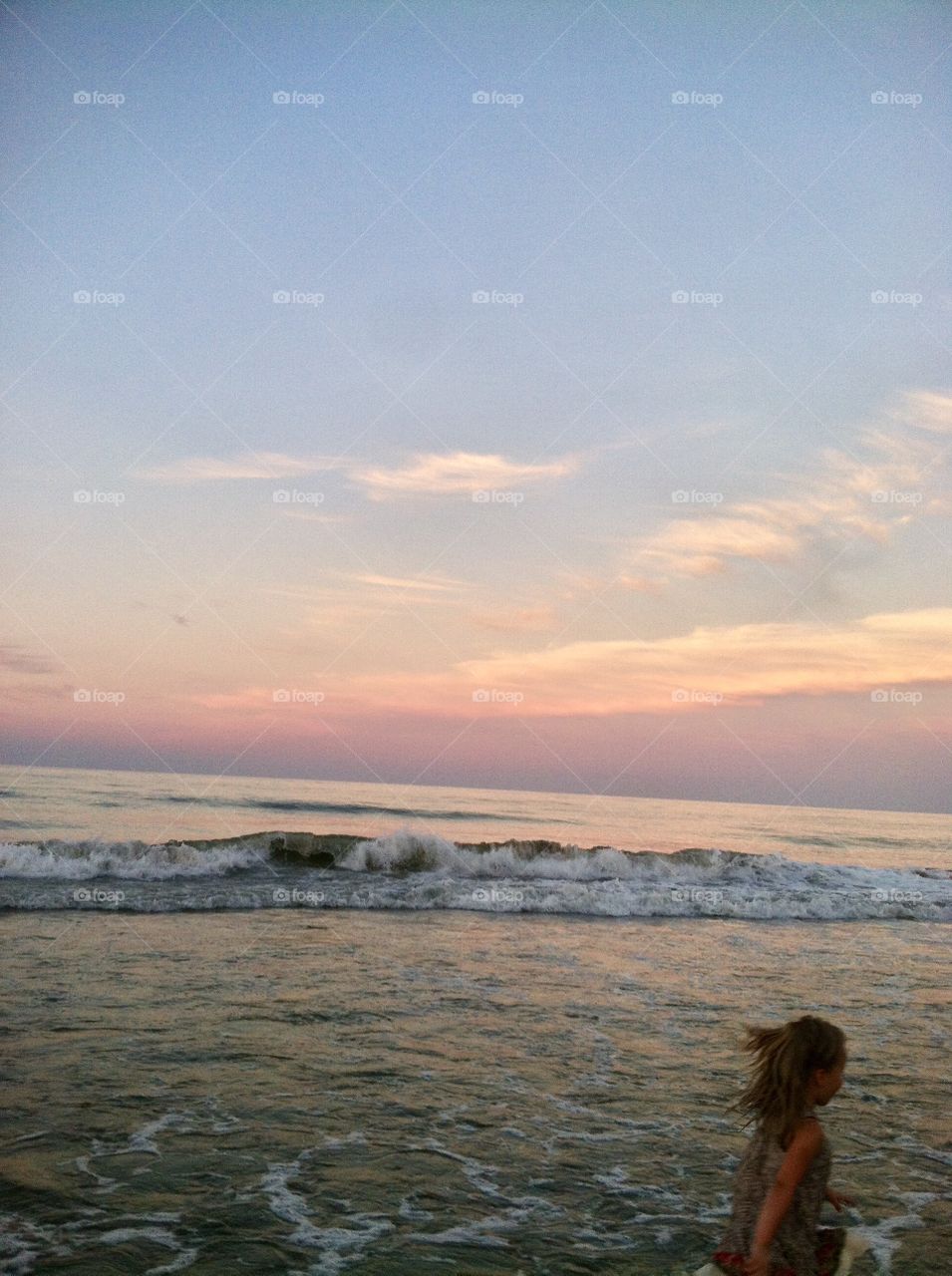 Girl Walking on Beach