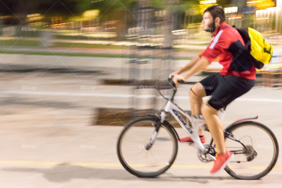 Young Man On Bike Ride In The City
