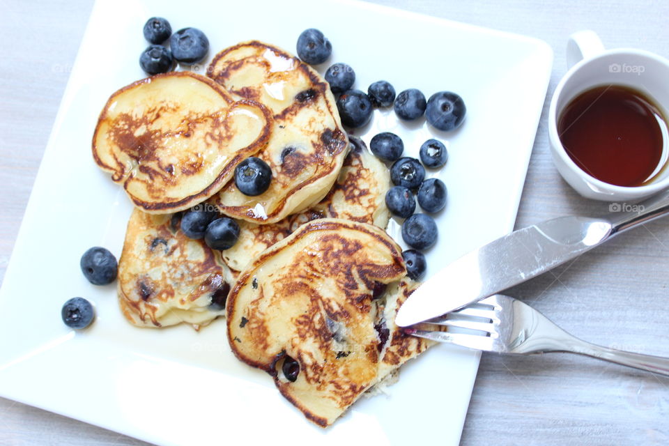 pancake on table with cup