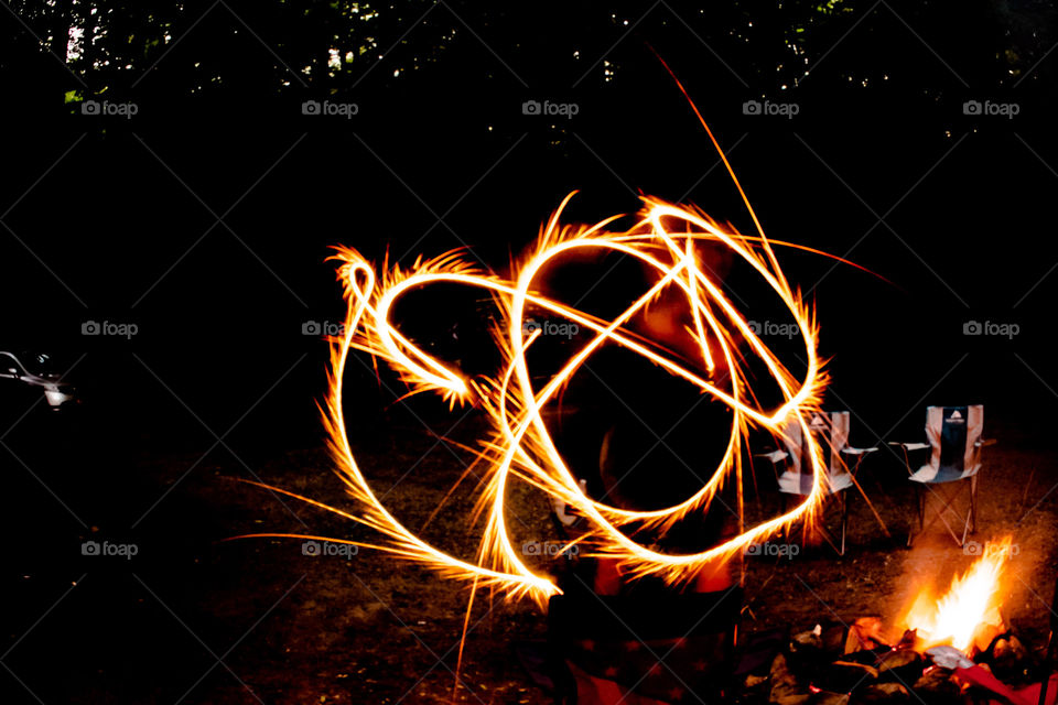 Long exposure of moving fire stick 