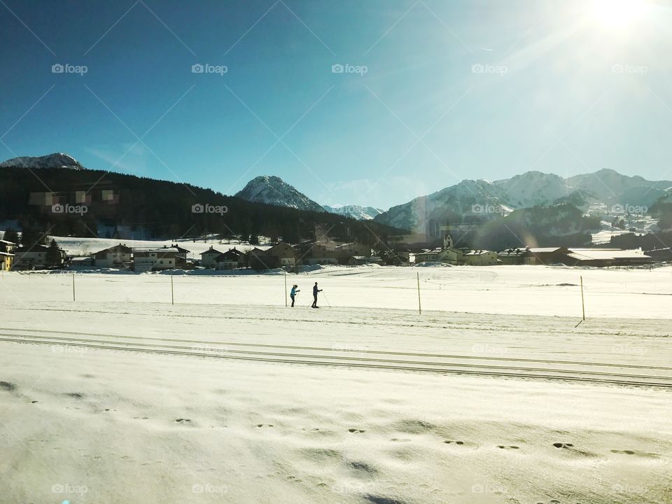People skiing in snow in Austria 