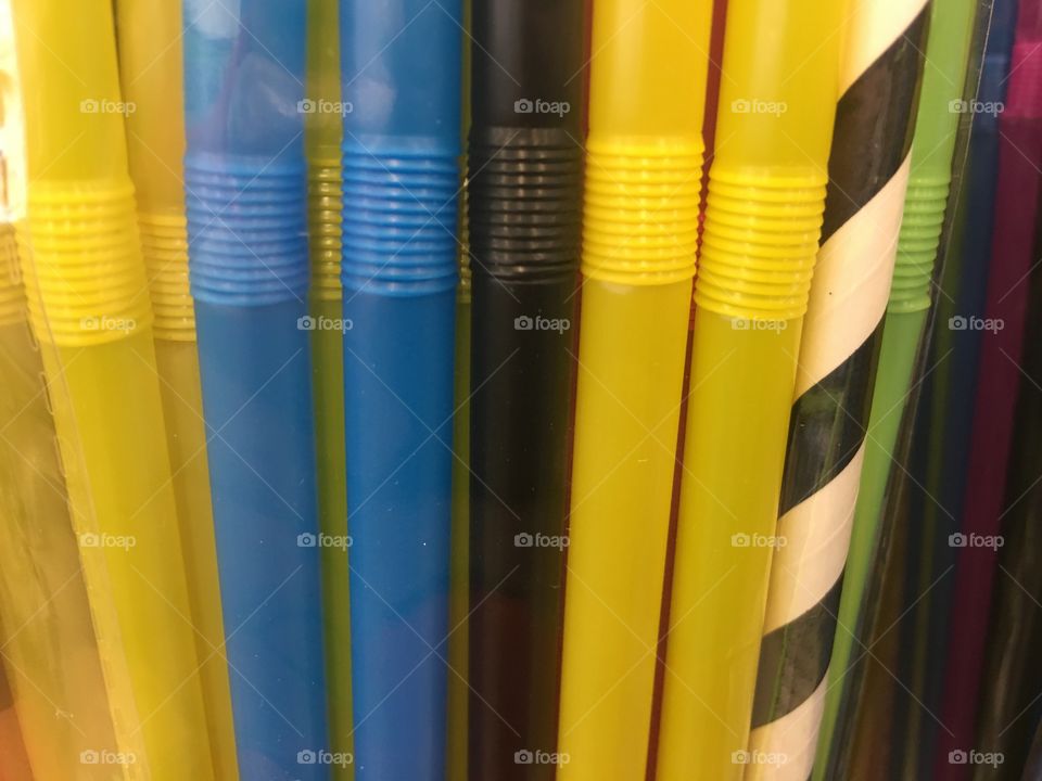 Colorful straws next to each other