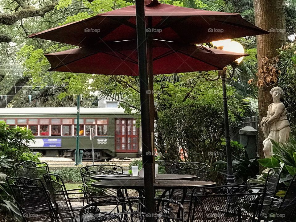 New Orleans Historic Streetcar from a Courtyard on St Charles. 