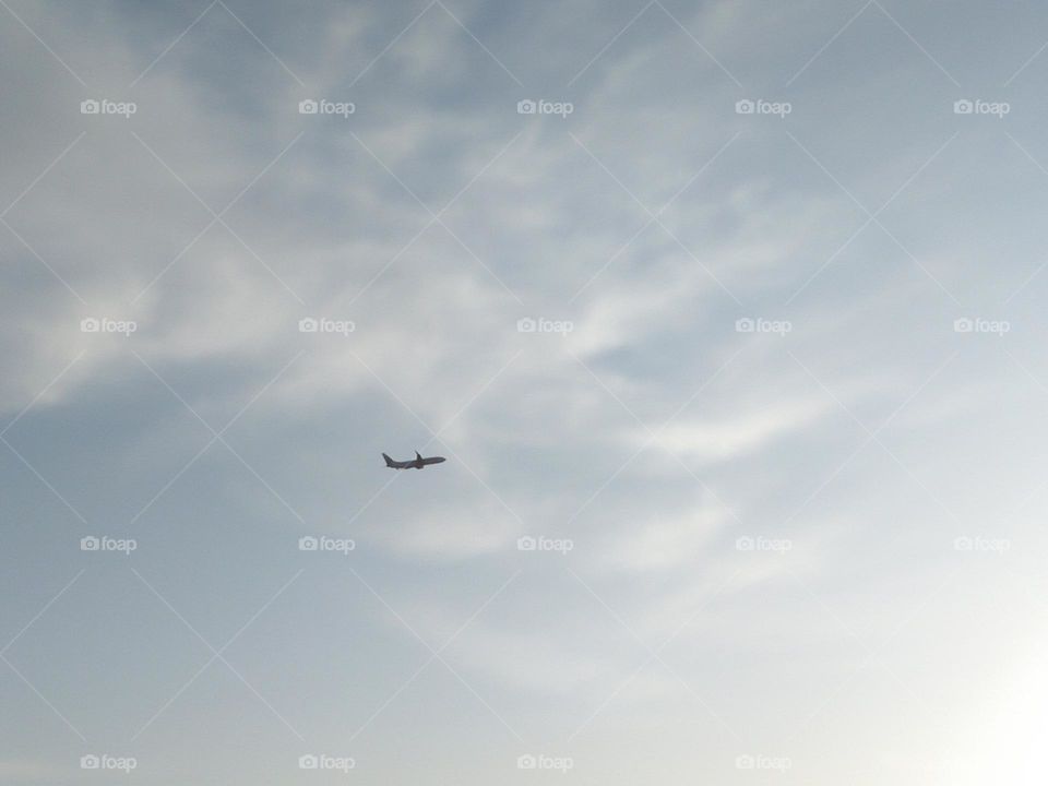 Beautiful plane flying cross the sky