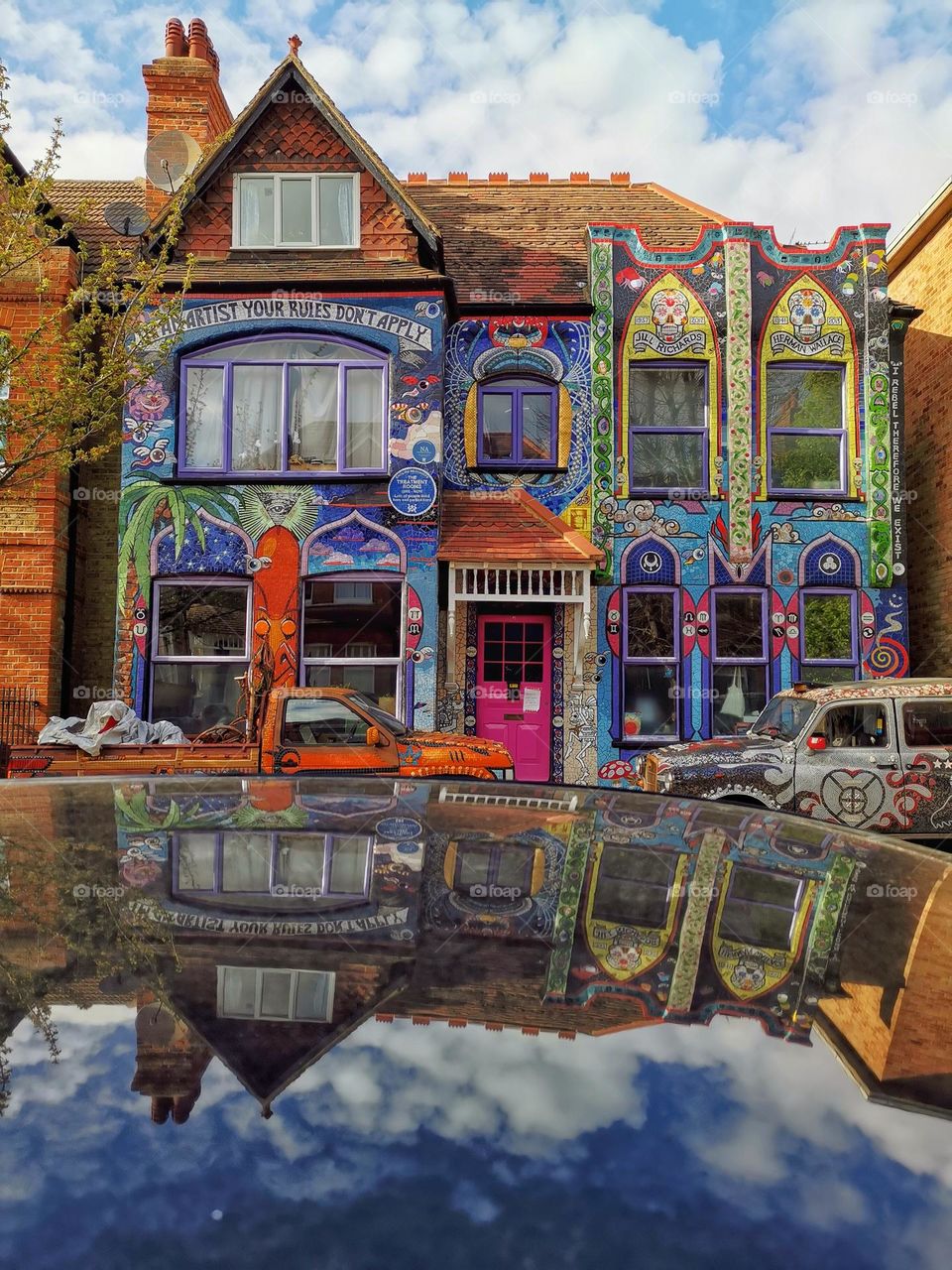 Visual street art, Mosaic House in London. Reflection. Colourful house. Beautiful architecture. Sunny day. Streetphoto.