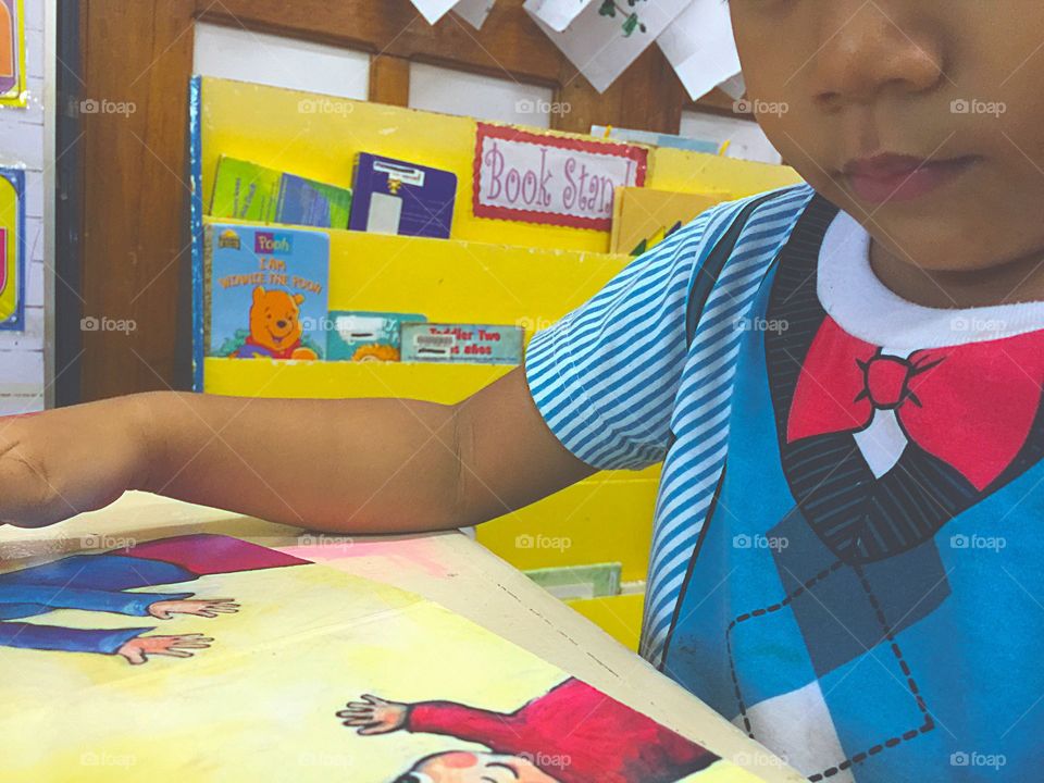 A little boy reading