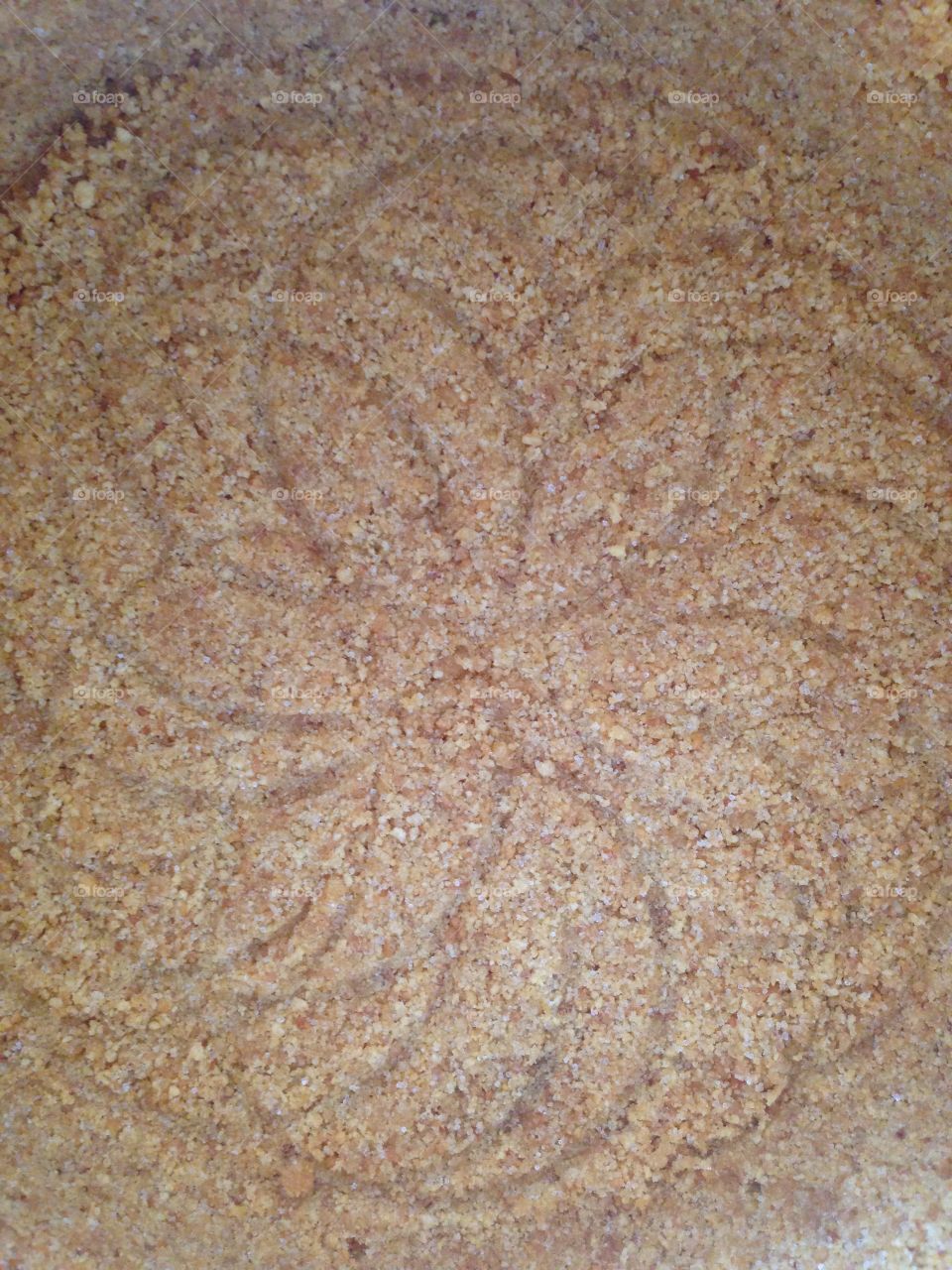 Pattern in sand (graham crackers)