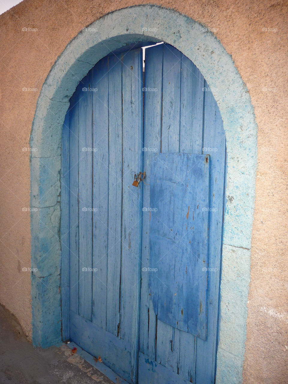 Pastel door in Santorini' s island...