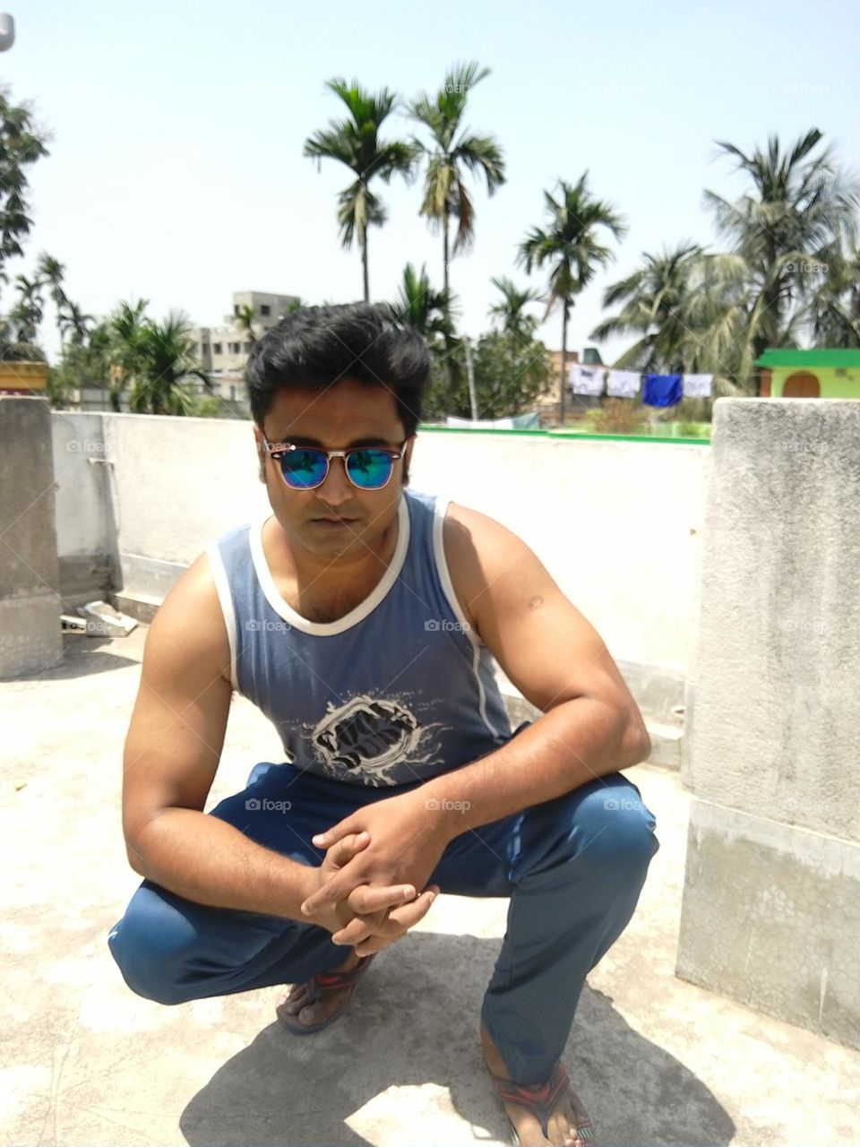 MODEL WITH BLUE SUNGLASSES